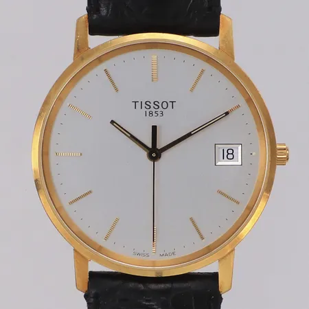 Herrur Tissot 18K, quartz, 33mm, datum, går ej, läderarmband, gravyr För nit och redlighet i rikets tjänst, manual, etui.