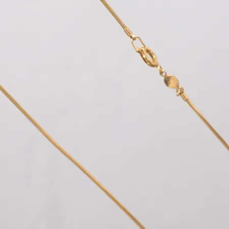 Kedja ormlänk något ojämn längd 40cm bredd 1,50mm 18k Vikt: 9,5 g