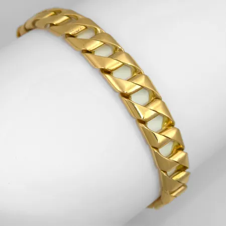 Armband, 18K guld, kraftig massiv modell, längd knäppt 21,5 cm, bredd 11 mm, tjocklek 3,8 mm, fint skick Vikt: 69,1 g