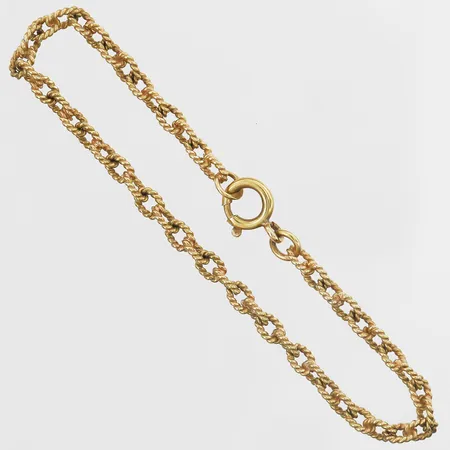 Armband längd 18,5cm, bredd 4mm, något ojämna länkar, 18K Vikt: 7,9 g