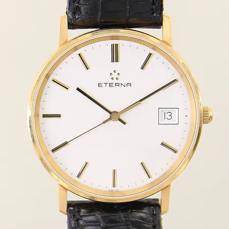 Herrur Eterna 18K quartz ref-nr:4100.68 Ø33mm, safirglas, datum, läderband original med lätt slitage, gravyr, fungerar ej, i behov av batteribyte, 18K