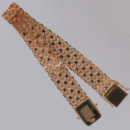 Armband X-länk längd ca 19,2cm, bredd 12,8mm, N S E Guldvaru Aktiebolag år 1991 Köping, 18K Vikt: 30 g