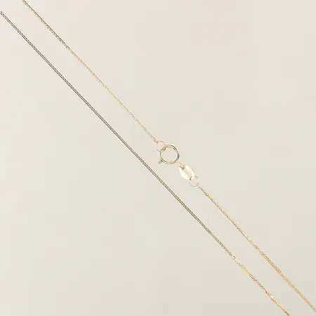 Kedja längd 45cm bredd 0,4mm 18K Vikt: 0,6 g