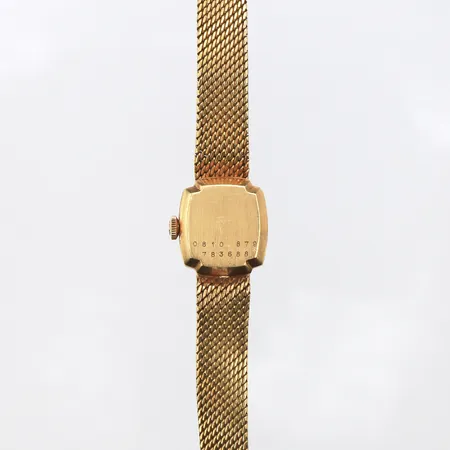 Damur Certina 18K, 15x14mm, manuell, boettnr: 0810 879 783688, integrerat klockarmband i 18K, oljämnheter på länken, bruttovikt: 29,9g.