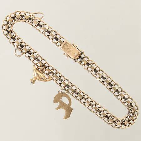 Armband X-länk med 2 berlocker längd 20,5cm bredd 6,2mm, 2 extra öglor 18K Vikt: 13,3 g