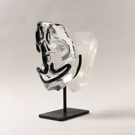 Skulptur "Janus", Bengt Lindström, glas, signerad, numrerad 8/8, svartad metallsockel med bruksslitage, ca 37x27x15cm inklusive sockel. Vikt: 0 g Skickas med postpaket.