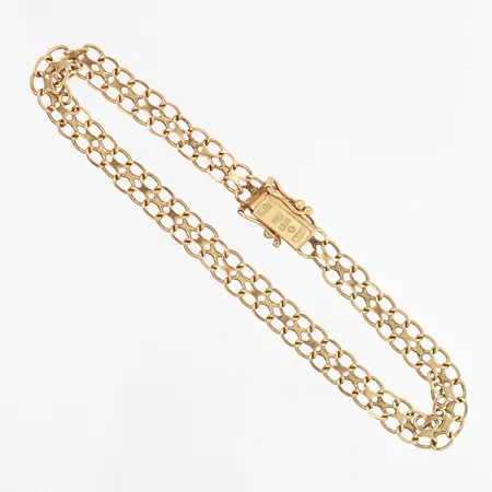 Armband X-länk längd 18cm, bredd 6mm, skeva/defekta länkar, 18K Vikt: 5,2 g