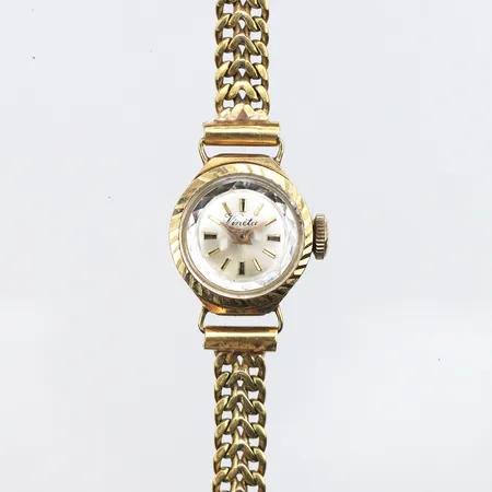 Damur Vineta 14K, 15mm, manuell, Klockarmband fiskben i 18K, längd inklusive uret: 16,5cm, bredd: 6mm, bruttovikt: 15,9g.
