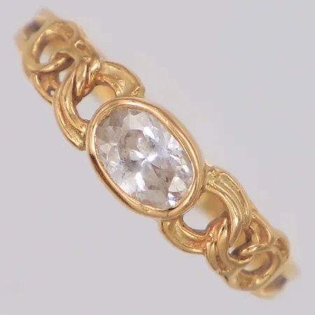 Ring med vit sten stl:17½, bredd 5mm, 18K  Vikt: 1,7 g