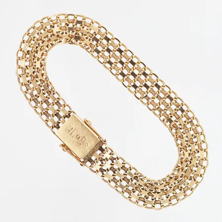Armband X-länk längd 19cm bredd 10mm, 18K Vikt: 15 g