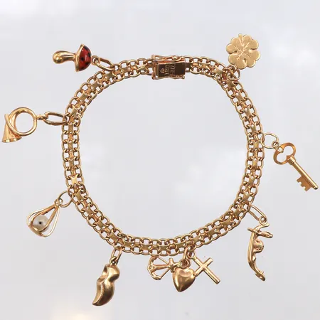 Armband x-länk med åtta berlocker, 19,5cm, bredd: 5,6mm, 18K Vikt: 19,5 g