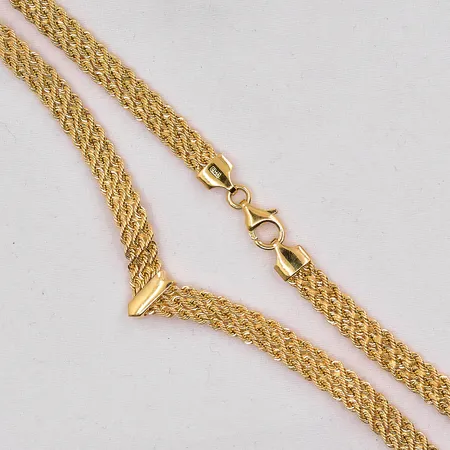 Collier treradig Cordell GHA längd 44cm, bredd 5mm, V-formad, 18K. Vikt: 9,9 g