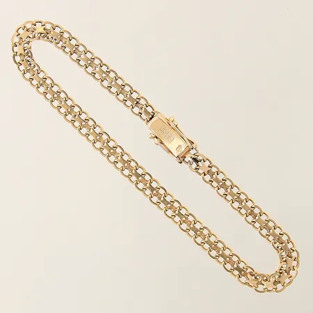 Armband X-länk längd 19cm bredd 5mm 18K  Vikt: 7,3 g