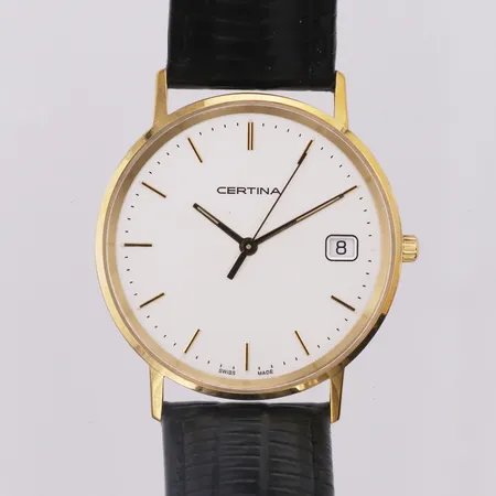 Herrur Certina 18K, graverad bakboett, med läderband.