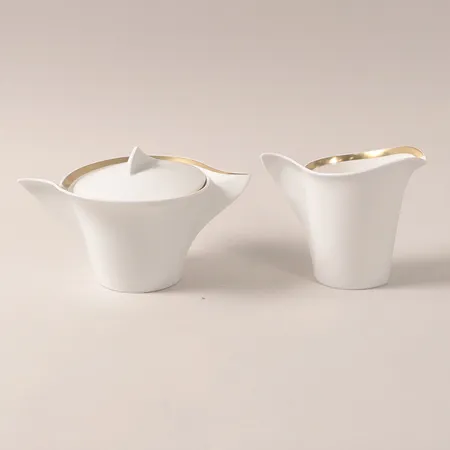 Sockerskål med lock och gräddkanna New Wave Premium Gold, Villeroy & Boch, porslin, höjd: 8,5cm och 10,5cm, bruksskick. Vikt: 0 g Skickas med postpaket.