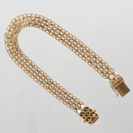 Armband x-länk  saknas en låsåtta längd 20cm bredd 9mm 18k Vikt: 19,4 g