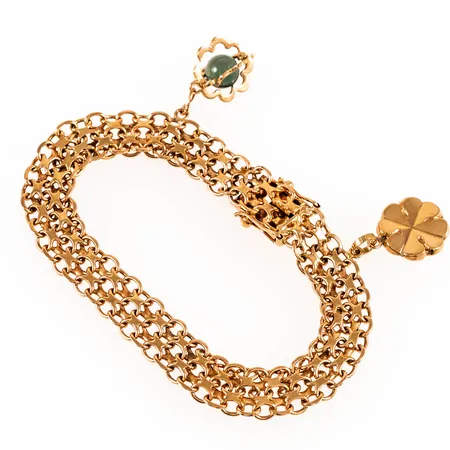 Armband X-länk 17,5cm bredd 9mm med två berlocker, 18K 16,1g. 