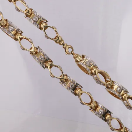 Collier, längd 71cm, bredd 11,4mm, bucklig, vitguldsdetaljer, OBS ej märkesdesign!, 14K Vikt: 63 g