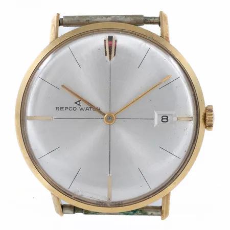 Herrur Repco Watch guld 18K manuell 33mm, datum, plexiglas, länk/band saknas, repigt sprucket glas, inga tillbehör.