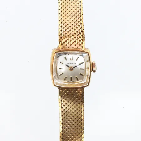 Damur Certina 18K, 15x14mm, manuell, boettnr: 0810 879 783688, integrerat klockarmband i 18K, oljämnheter på länken, bruttovikt: 29,9g.