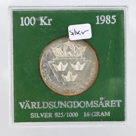 Jubileumsmynt, nominellt värde 100sek, 1985 Världsungdomsåret, 925/1000 silver Vikt: 16 g