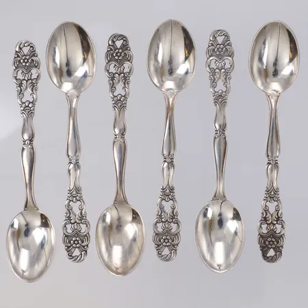 Sex moccasedar med genombruten floral dekor, längd ca 9,8mm, ett par med gravyr Mignon, GAB  år 1958-59, 830/1000 silver Vikt: 46 g