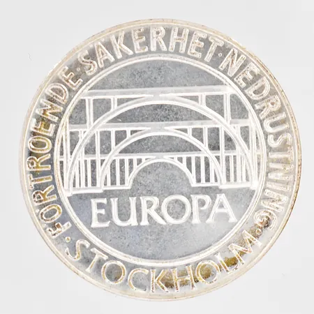 Minnesmynt 100kr Europa Förtroende Säkerhet Nedrustning Stockholm Sverige år 1984, Ø32mm, plastetui silver 925/1000 Vikt: 16 g
