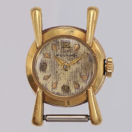 Damur Movado 18K, manuell, 18,5mm, boettnr 1308 B17344, skadad urtavla, boett och glas, bruttovikt 11,3g, inga tillbehör. 