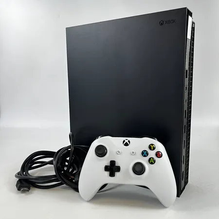 X-box One X, modell 1787, serienr: 060800174717, elkabel, HDMI-kabel, handkontroll, ej funktionstestad. Skickas med postpaket.