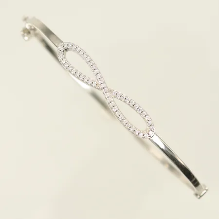 Armring med evighetstecken och vita stenar 72 x 60mm, bredd 2-6mm, Silver 925/1000, 9,3g Vikt: 9,3 g