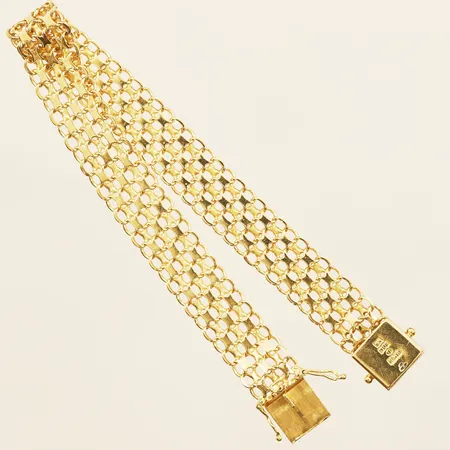 Armband X-länk längd 18,5cm, bredd ca 10mm, Mikkov Ab August, Stockholm år 1963, kistlås, 18K. Vikt: 14,4 g