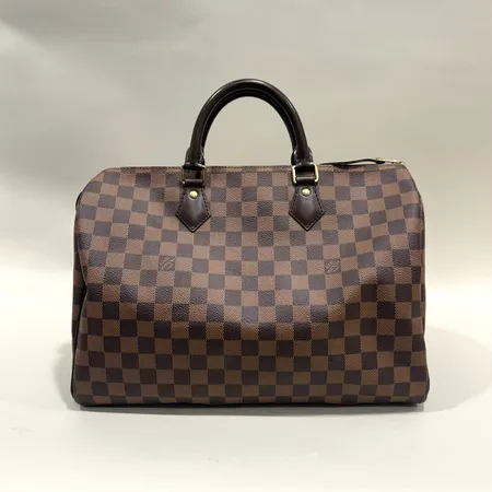 Väska Louis Vuitton Speedy 35 Damier Ebene canvas modell-nr:N41363 datumkod:RI2176 hänglås med nyckel medföljer, mått ca 35x28x19cm, kvitto från Birger Jarlsgatan år 2016, dustbag, insida med skada vid läderrem samt mindre bläckfläckar