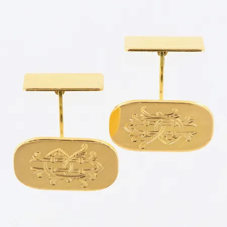 Ett par manschettknappar 19x14mm monogram 18K. Vikt: 9,2 g