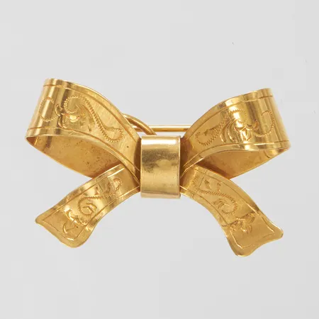 Brosch rosett längd 3,5cm, höjd 22mm, Stigbert för Heribert Engelbert, Stockholm, 1953, 18K Vikt: 4,9 g