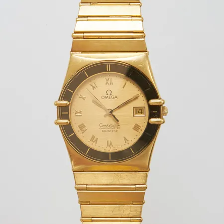 Armbandsur Omega Constellation Chronometer 18K, quartz, 34mm, boettnr 1431, datum, länk i 18K, repig, går ej, servicebehov, bruttovikt: 103,2g