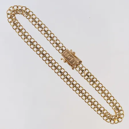 Armband X-länk Ädelsmycken Aktiebolag längd 19cm, bredd ca 5,3mm, år 1973, 18K Vikt: 6,4 g