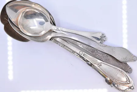1 gaffel och 7 skedar längd 14-23 cm, silver 830/1000. Vikt: 317,6 g
