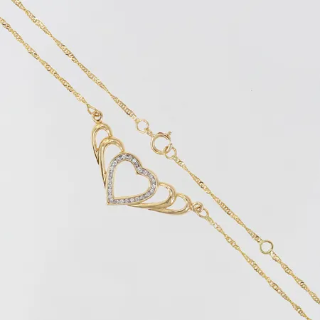 Collier med integrerat hänge med diamanter ca 26 x 0,0025ct, längd 42-45cm, bredd ca 1,3-12mm, 18K Vikt: 3,6 g
