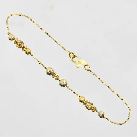 Armband med kulor längd 21 cm, bredd 1-5 mm, s-lås, 22K. Vikt: 4,8 g
