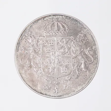 Jubileumsmynt 50kr, Ø36mm, Kungabröllopet 19 juni 1976 Konung Carl XVI Gustav och Drottning Silvia, 925/1000 Vikt: 27 g Vikt: 27 g