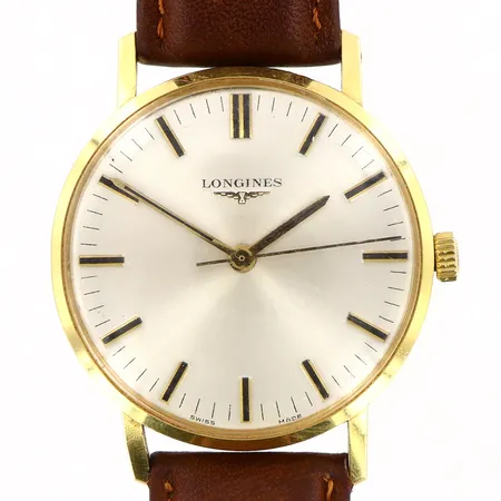 Herrur Longines Ø34mm manuell, läderband ca 21,5cm, bruksslitage, gravyr, inga tillbehör, kronan glappar, boett i 18K. Vikt: 0 g