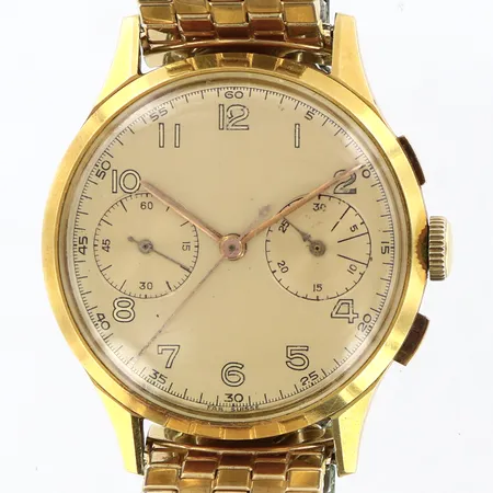 Herrur kronograf 18K i boett, manuell Ø36mm, omärkt, fab suisse, flexlänk i stål, bucklor/repor på bakboett, repor på glas Vikt: 0 g