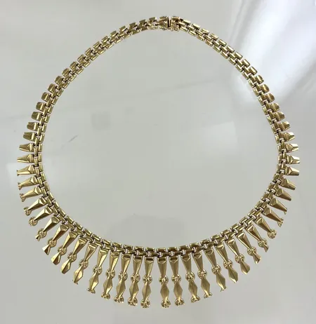 Collier längd 42 cm bredd 6-28 mm, 18K Vikt: 27,9 g
