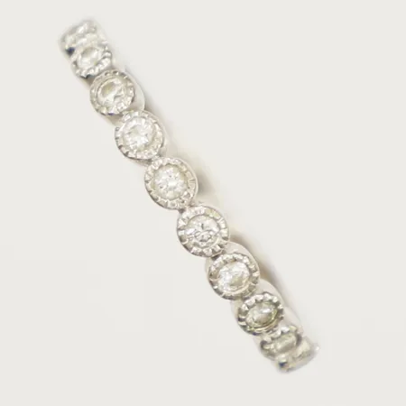Ring med diamanter 10 x ca 0,01ct stl:16, bredd 1,8-2,3mm, vitguld 18K Vikt: 1,6 g