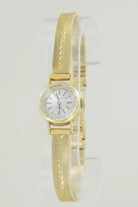 Damur Tissot saphir diam 17 mm, längd 19 cm bredd 1 cm, 18K 24,5 gr