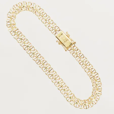 Armband X-länk längd 18,5cm bredd 6,3mm, GHA 18K Vikt: 6,7 g