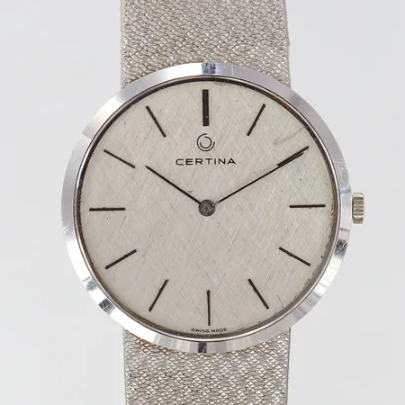 Herrur Certina 18K manuell Ø32mm boett-nr: 838644667 länk i 18K vitguld repor inga tillbehör. 