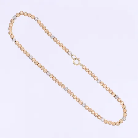 Armband med kulor längd 18,5cm bredd 2mm tvåfärgat 18K Vikt: 2,7 g
