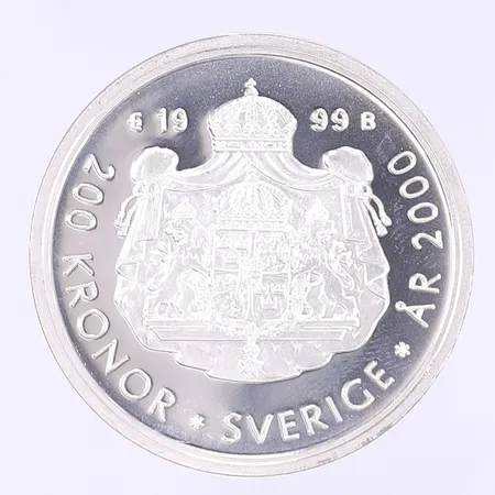 Jubileumsmynt Milleniumskiftet 1999-2000, nominellt värde 200kr, i etui, silver 925/1000 Vikt: 27,1 g