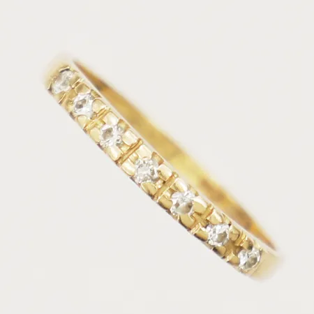 Ring med diamanter 0,15ct enligt gravyr stl:17 bredd 2mm Bo Andersson Uppsala AB År 1989 gravyr 18K Vikt: 2 g